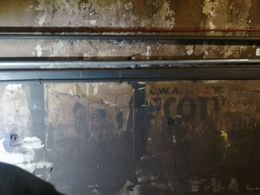 Faded advertisement on wall in Old Moorgate