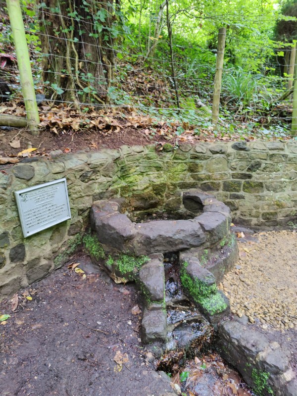 Wishing well and plaque at Waggoners Wells